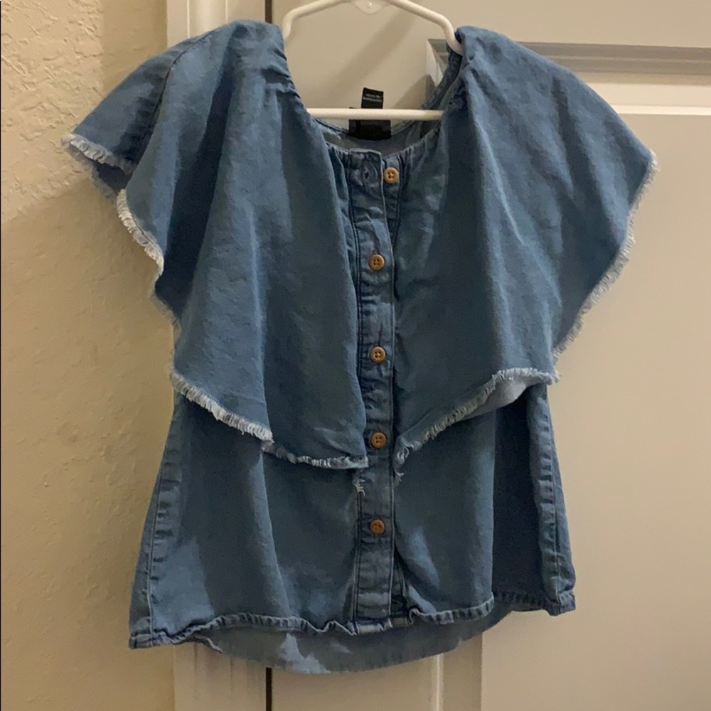 Ruffle jean shirt.